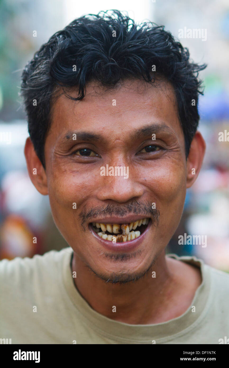 A man at a market in Yangon, Burma. Stock Photo