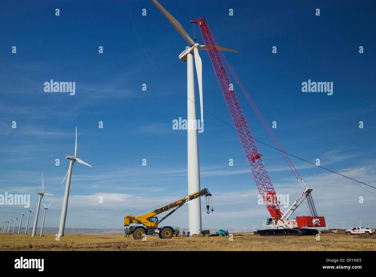 Manitowoc 16000 crawler crane and Grove rough terrain crane working on wind farm during turbine