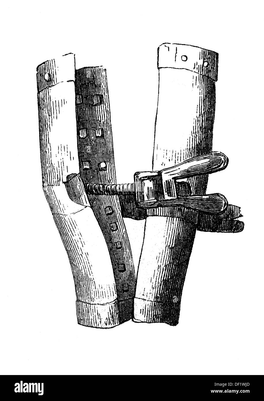 Instrument of torture: leg screws, Spanish boots, woodcut from 1864 Stock Photo