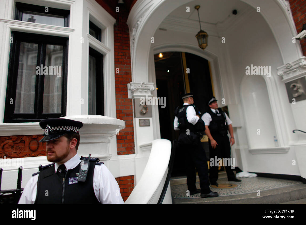 British police outside the Ecuador embassy in London, Britain 16 August 2012 where Wikileaks founder Julian Assange has sought p Stock Photo