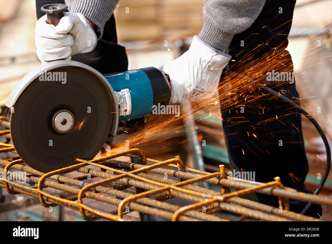 Cutting rebar, grinder, construction site, Eskoriatza, Gipuzkoa