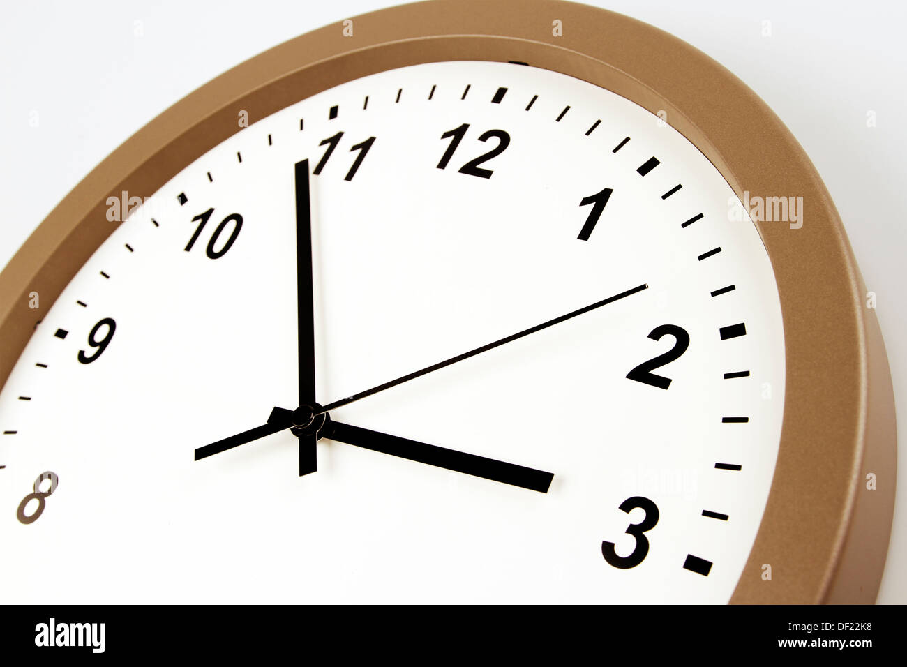 Closeup of hands on clock face Stock Photo Alamy