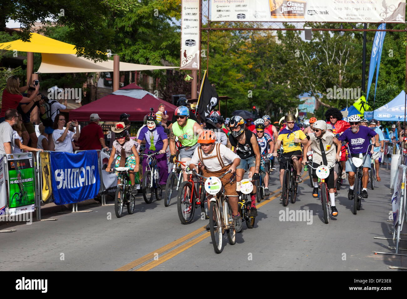 Cyclists in fancy dress taking part in the annual Charity cycle race
