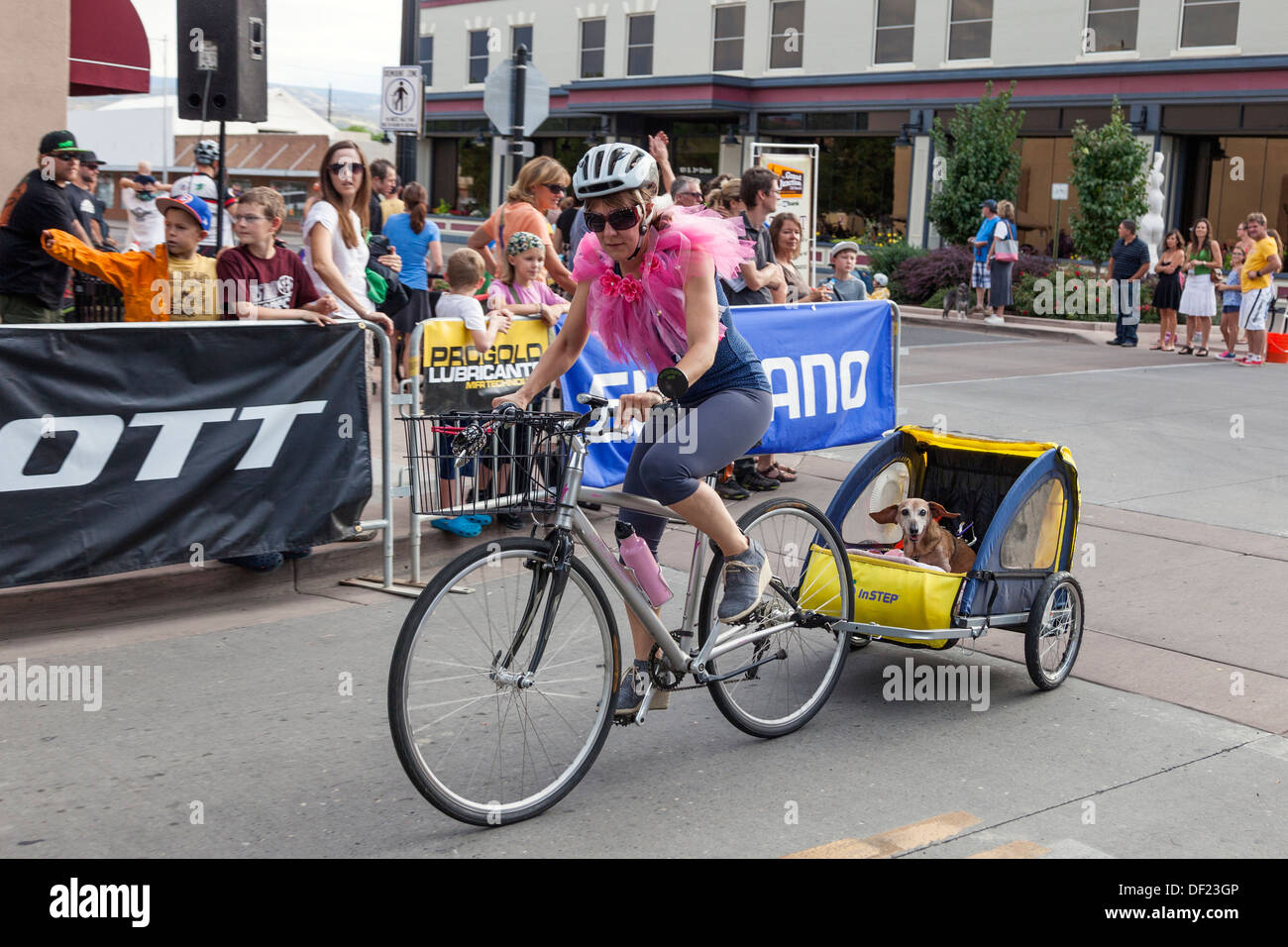 Cyclist in fancy dress taking part in the annual Charity cycle race, Grand Junction, Colorado, USA Stock Photo