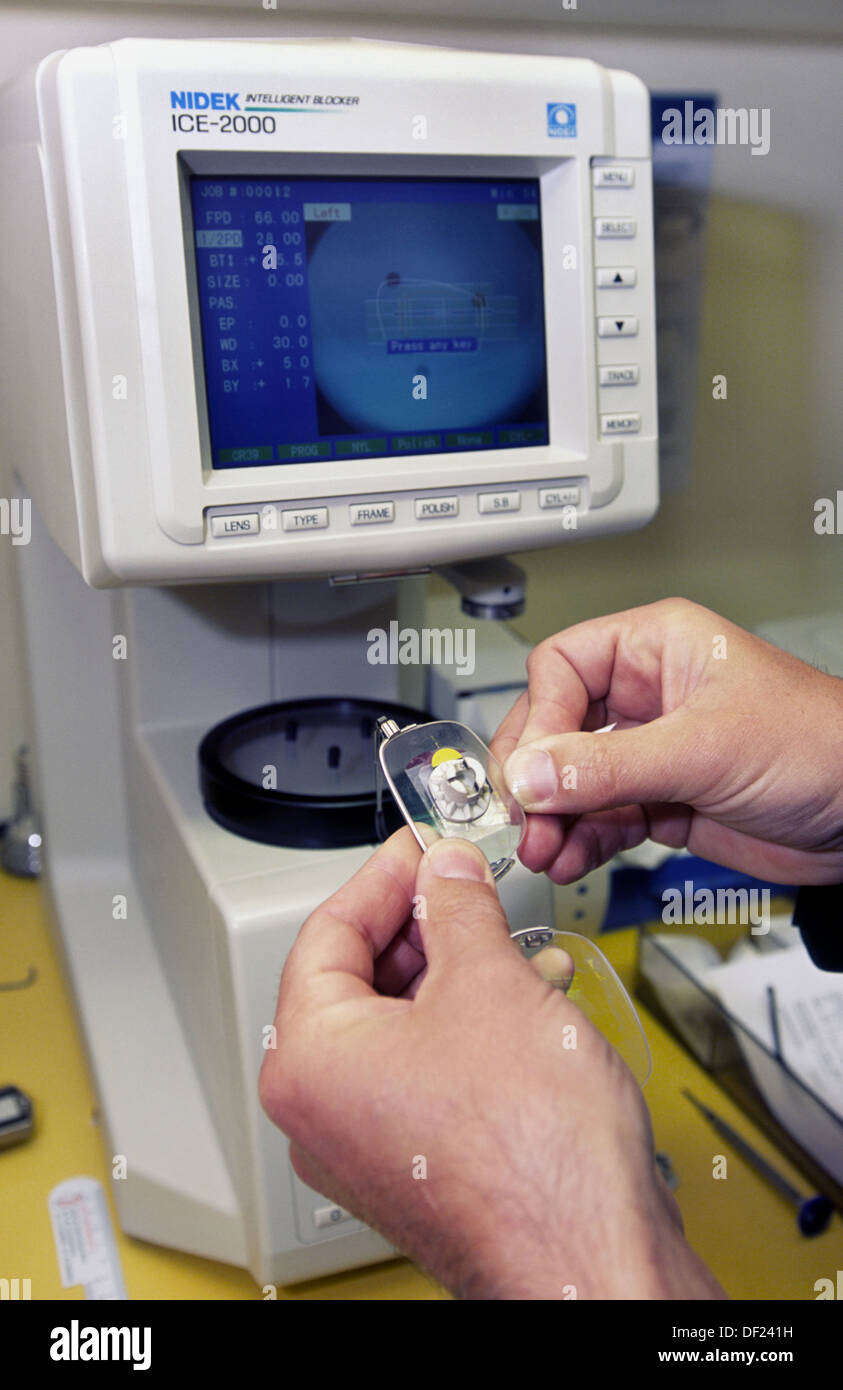 Grinding of optical lenses Stock Photo Alamy