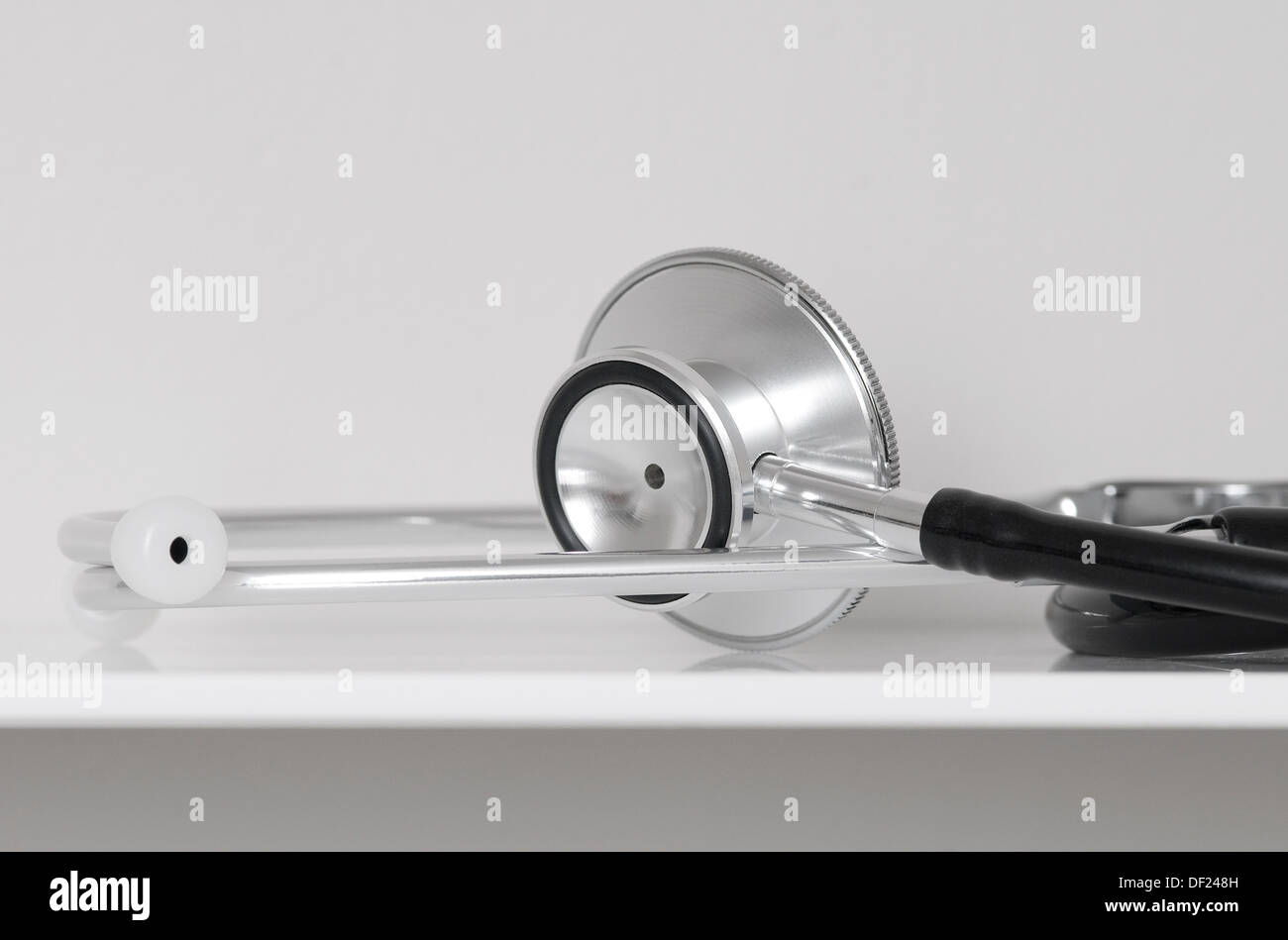 stethoscope on white shelf in hospital Stock Photo