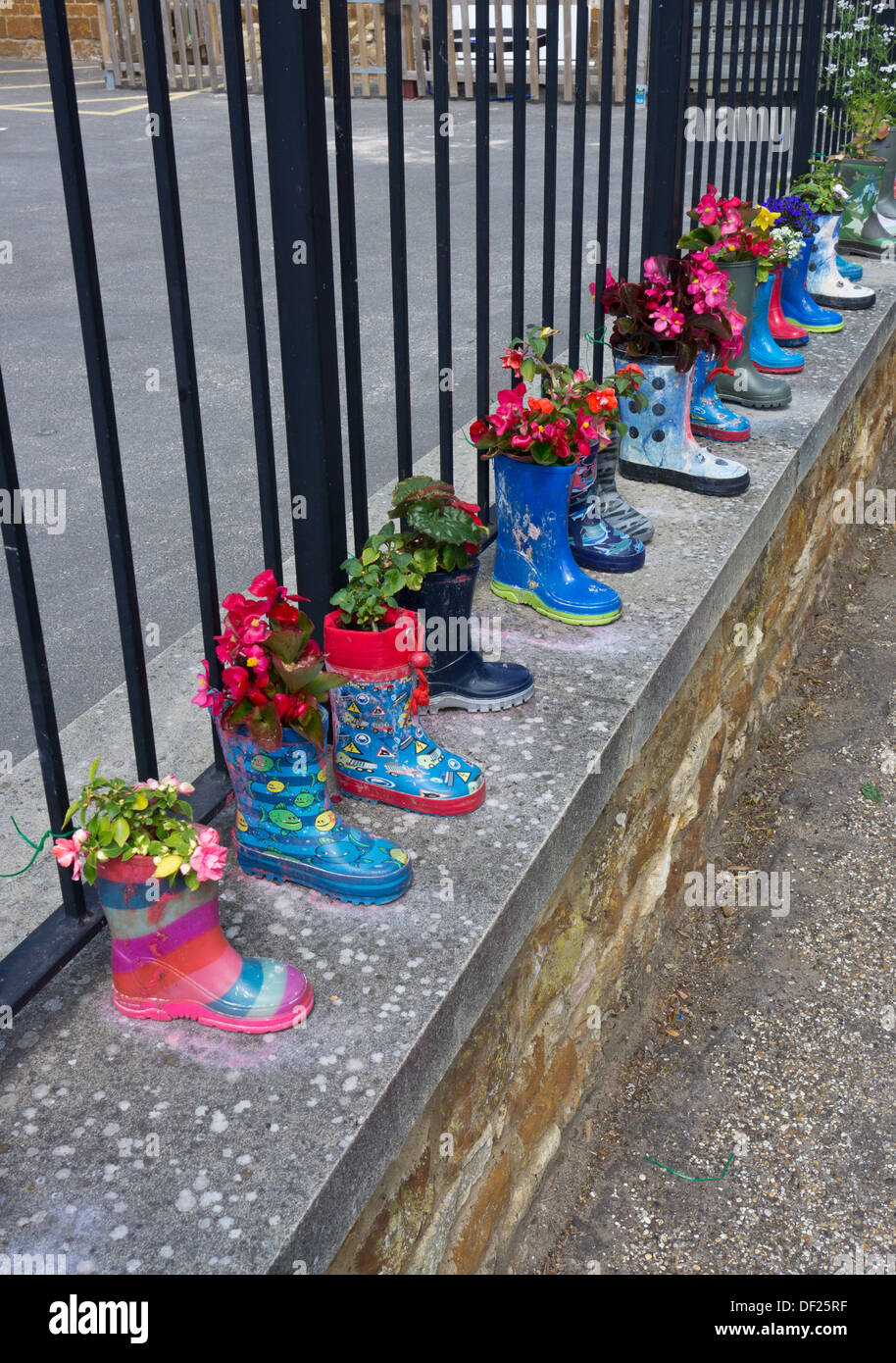 Planted flowers in boots hi-res stock photography and images - Alamy