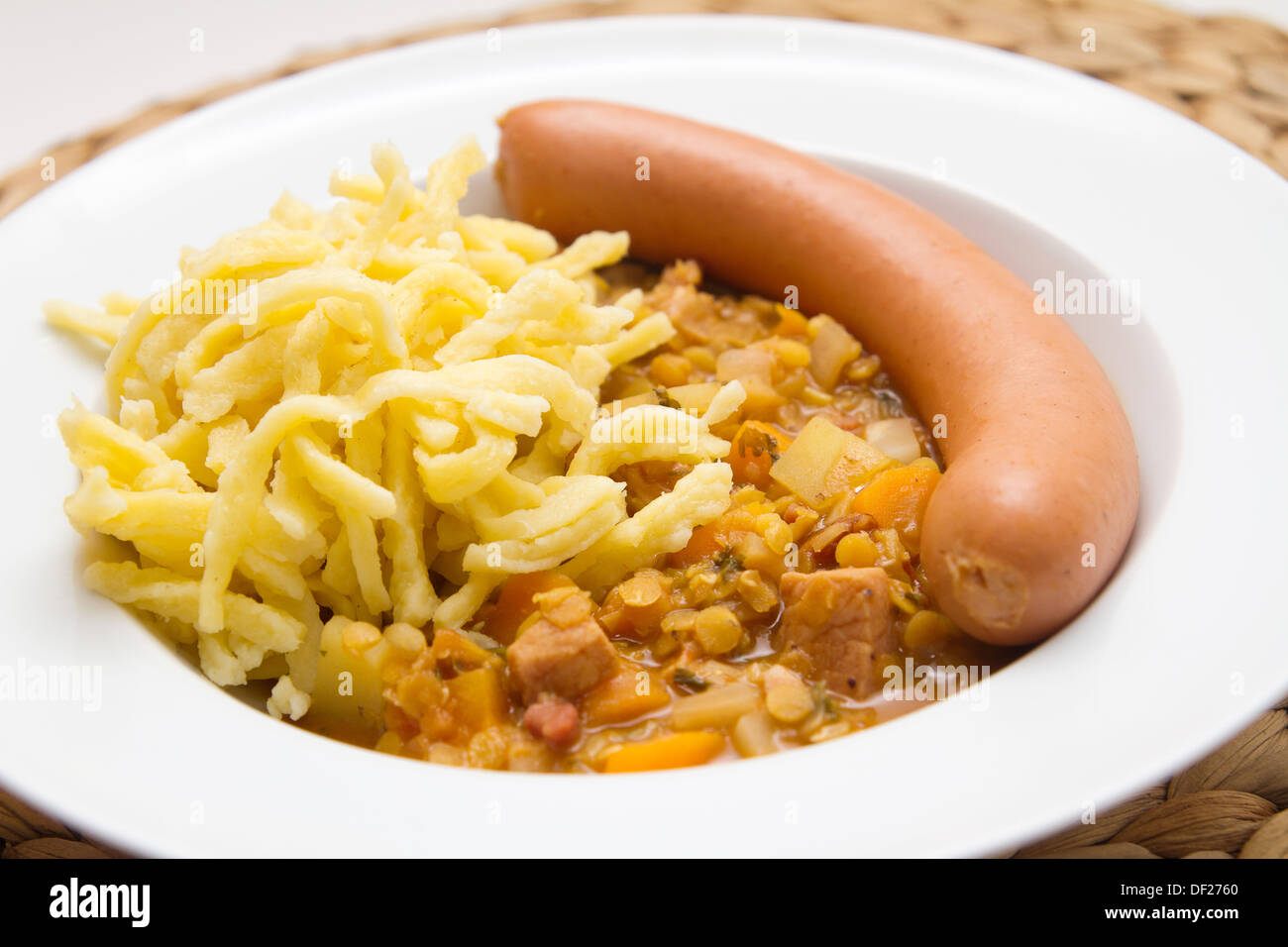 Lentils with spaetzle (noodles) and frankfurter sausage Stock Photo Alamy