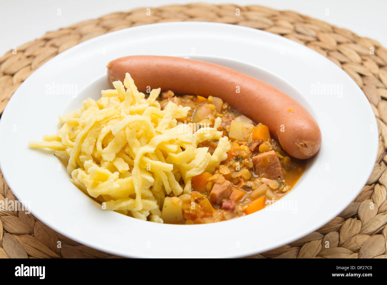 Lentils with spaetzle (noodles) and frankfurter sausage Stock Photo Alamy