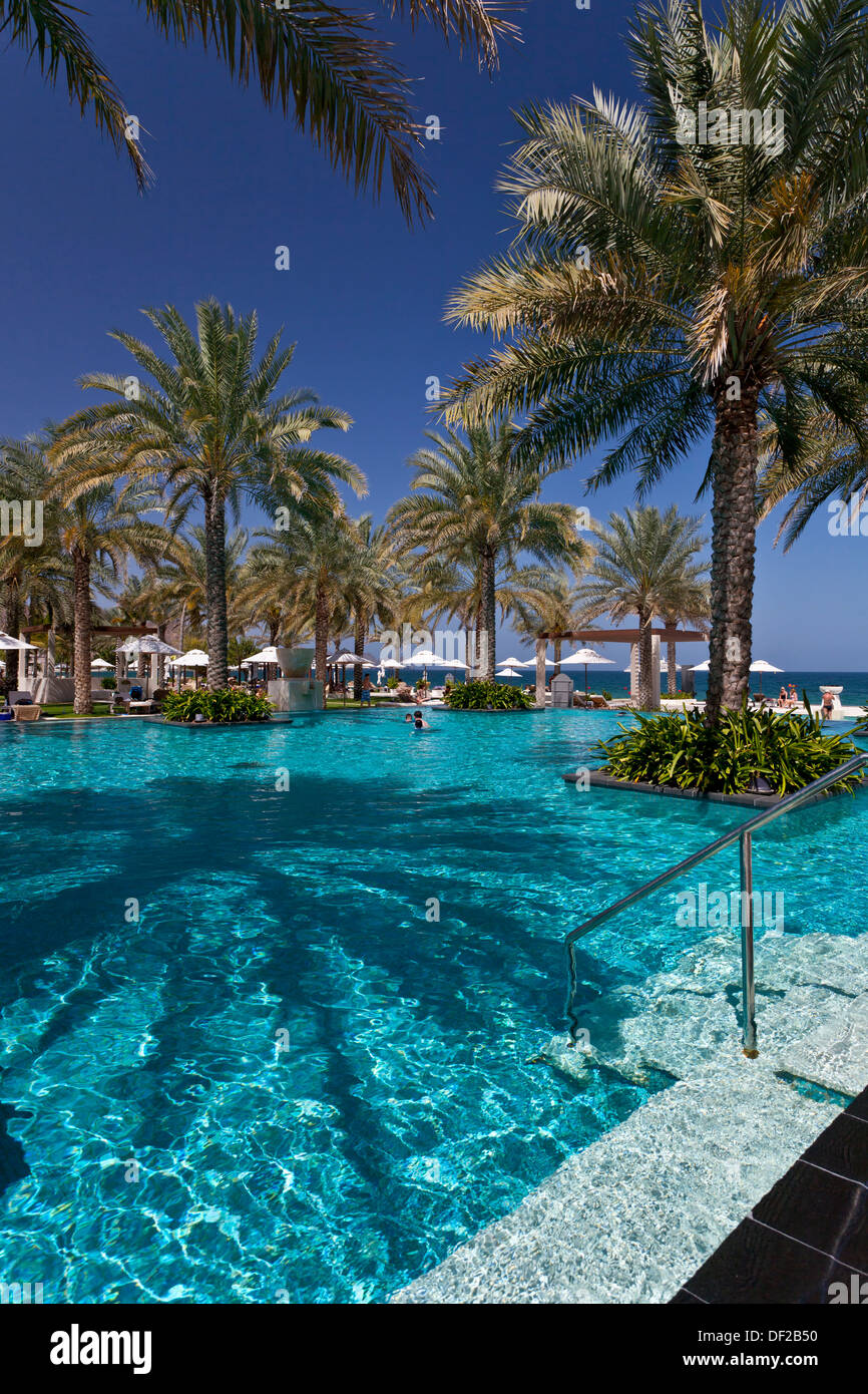 The swimming pool at the Al Bustan Palace Hotel and resort near Muscat
