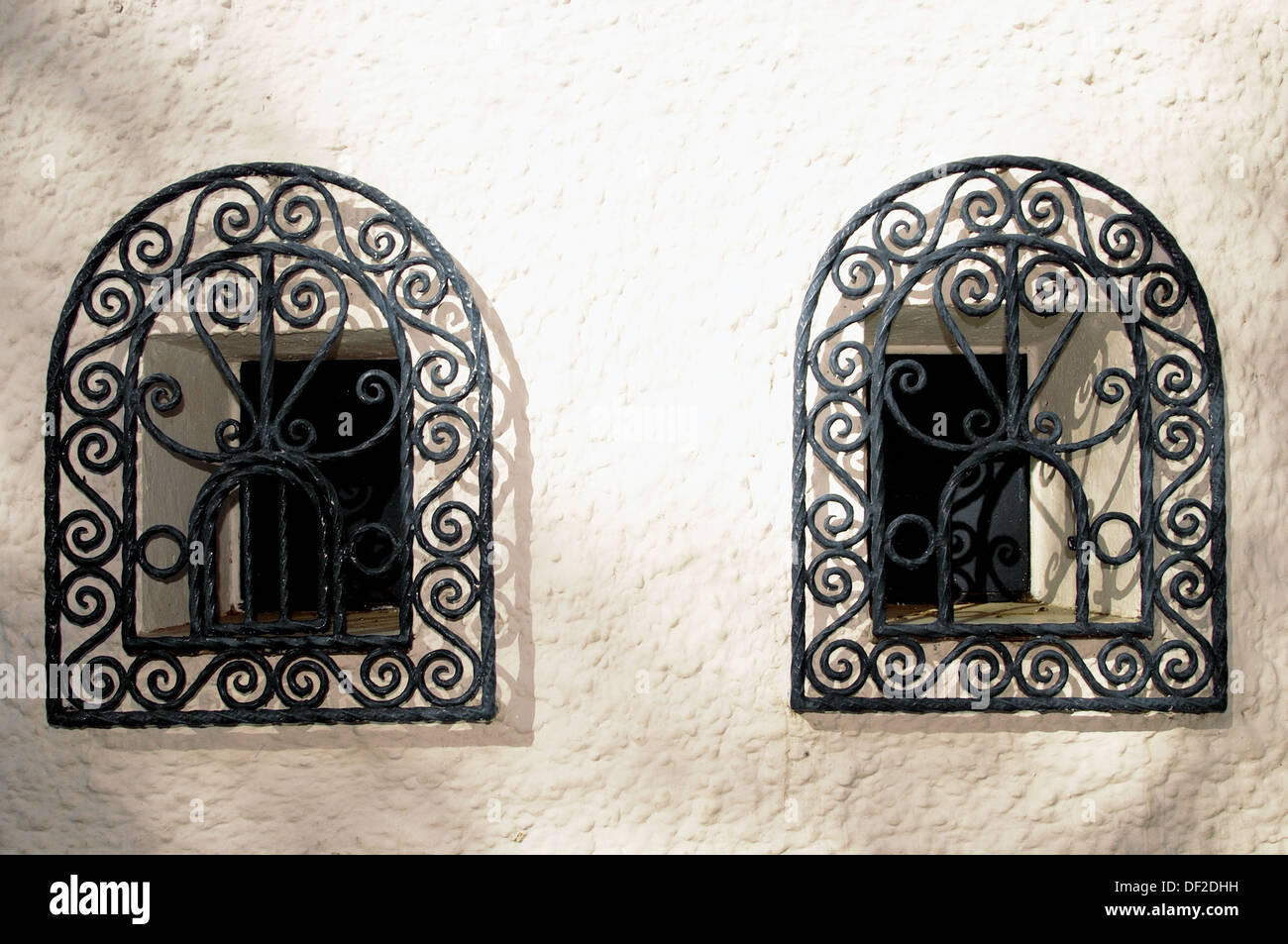 Wrought grilles at windows. Granada. Spain Stock Photo
