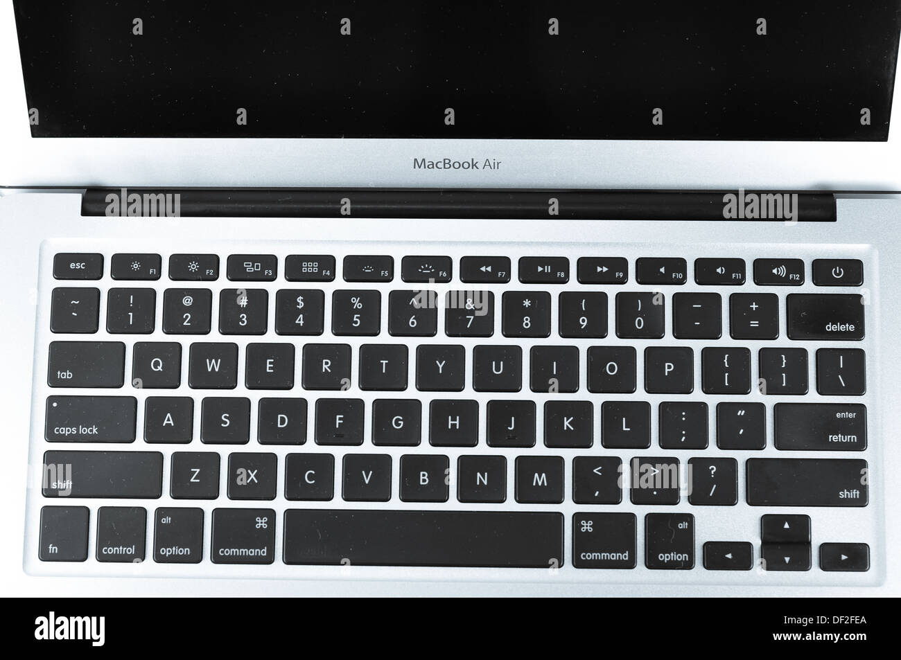 Macbook Air in different silhouette, keyboard and side. Stock Photo