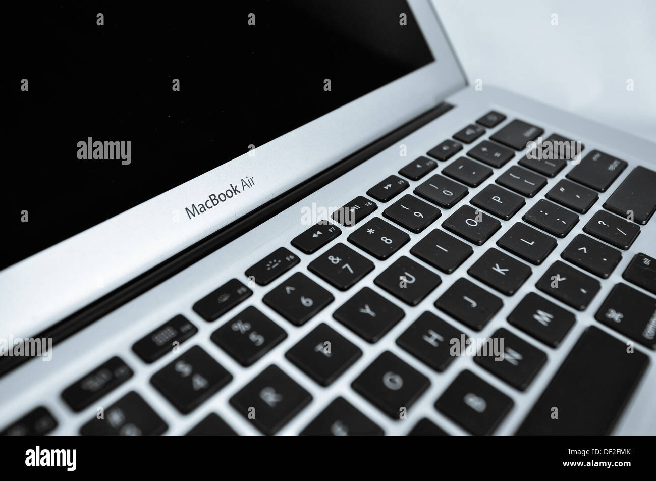 Macbook Air in different silhouette, keyboard and side. Stock Photo