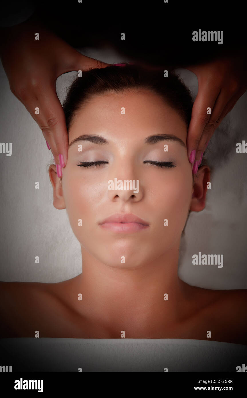 Wellness Woman Receiving Head Or Face Massage In Spa Hi Res Stock