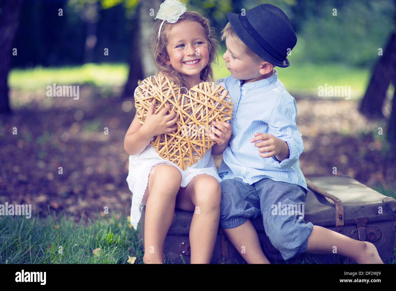 Portrait of cute couple of small kids Stock Photo - Alamy