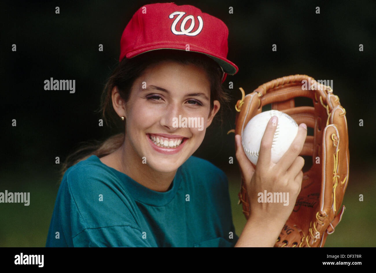 Young woman with softball in mitt Stock Photo Alamy