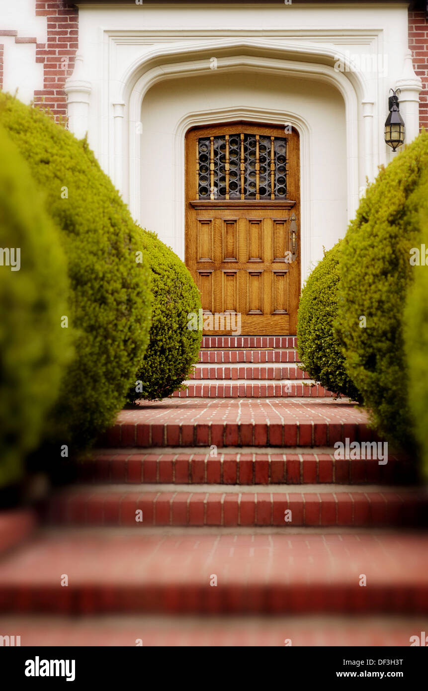 Entry To Home With Brick Walk And Wood Door San Francisco Stock