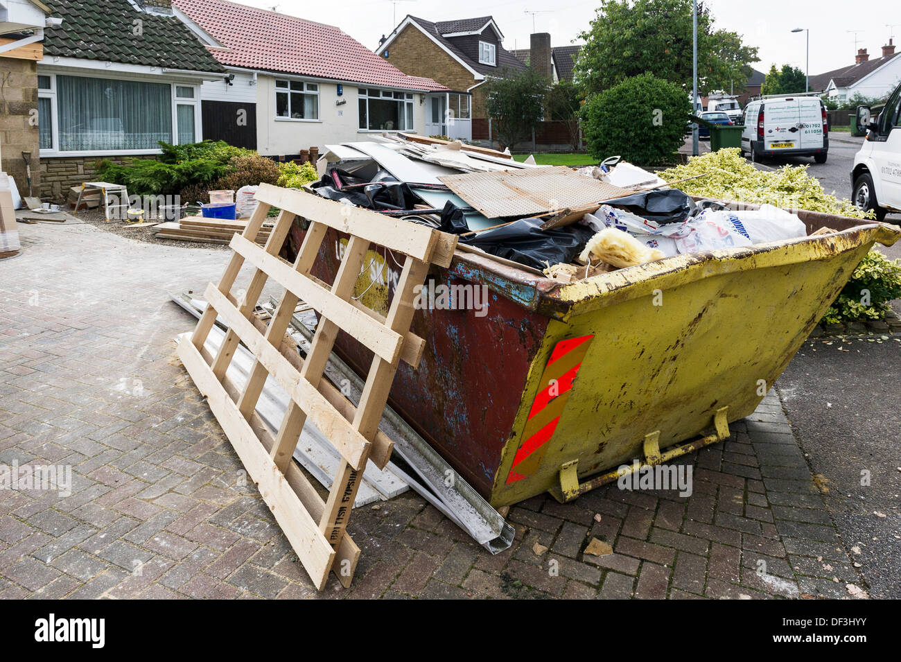 A skip full of rubbish Stock Photo Alamy