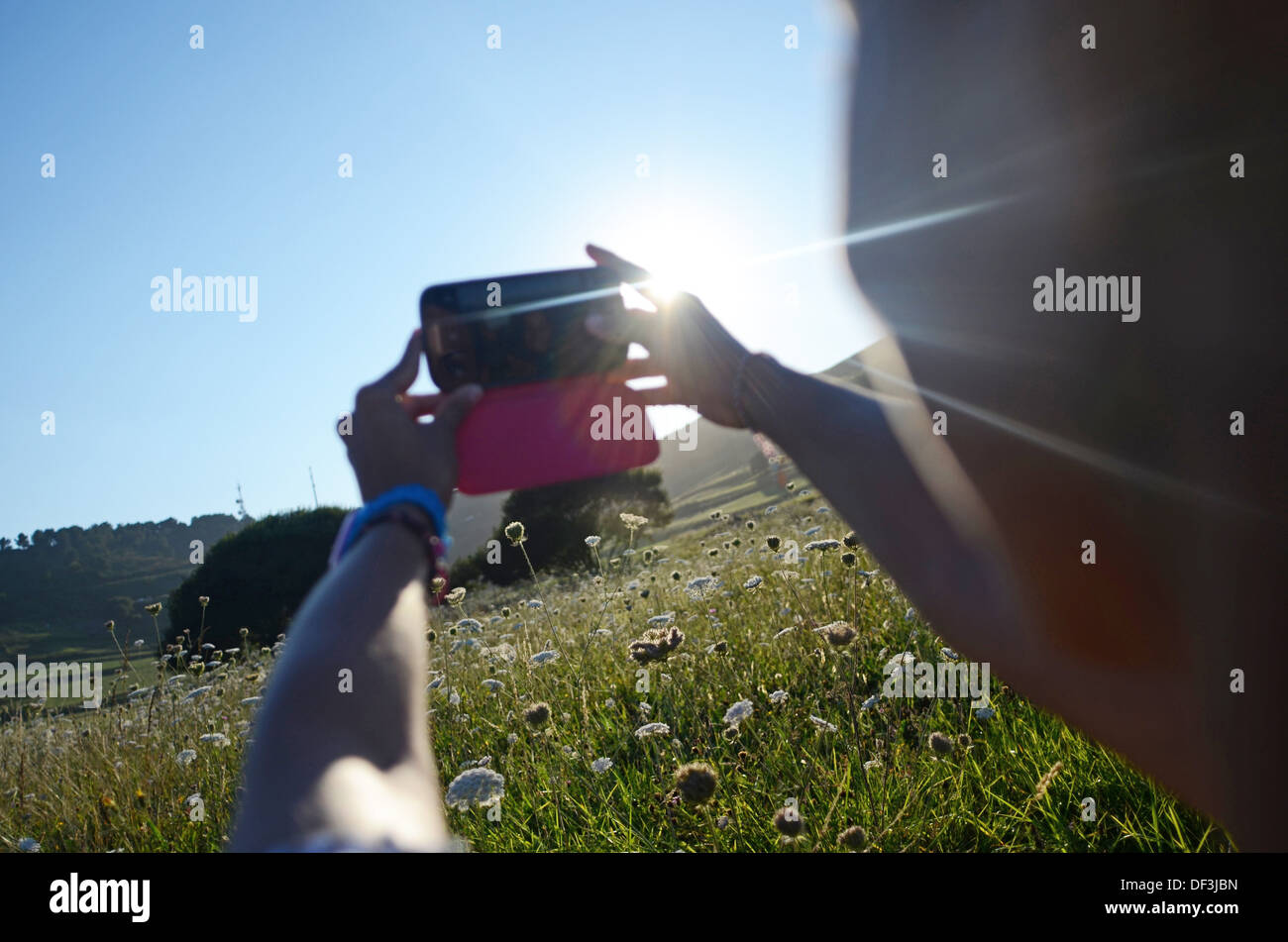 Attractive young woman takes a selfie with mobile phone Stock Photo - Alamy