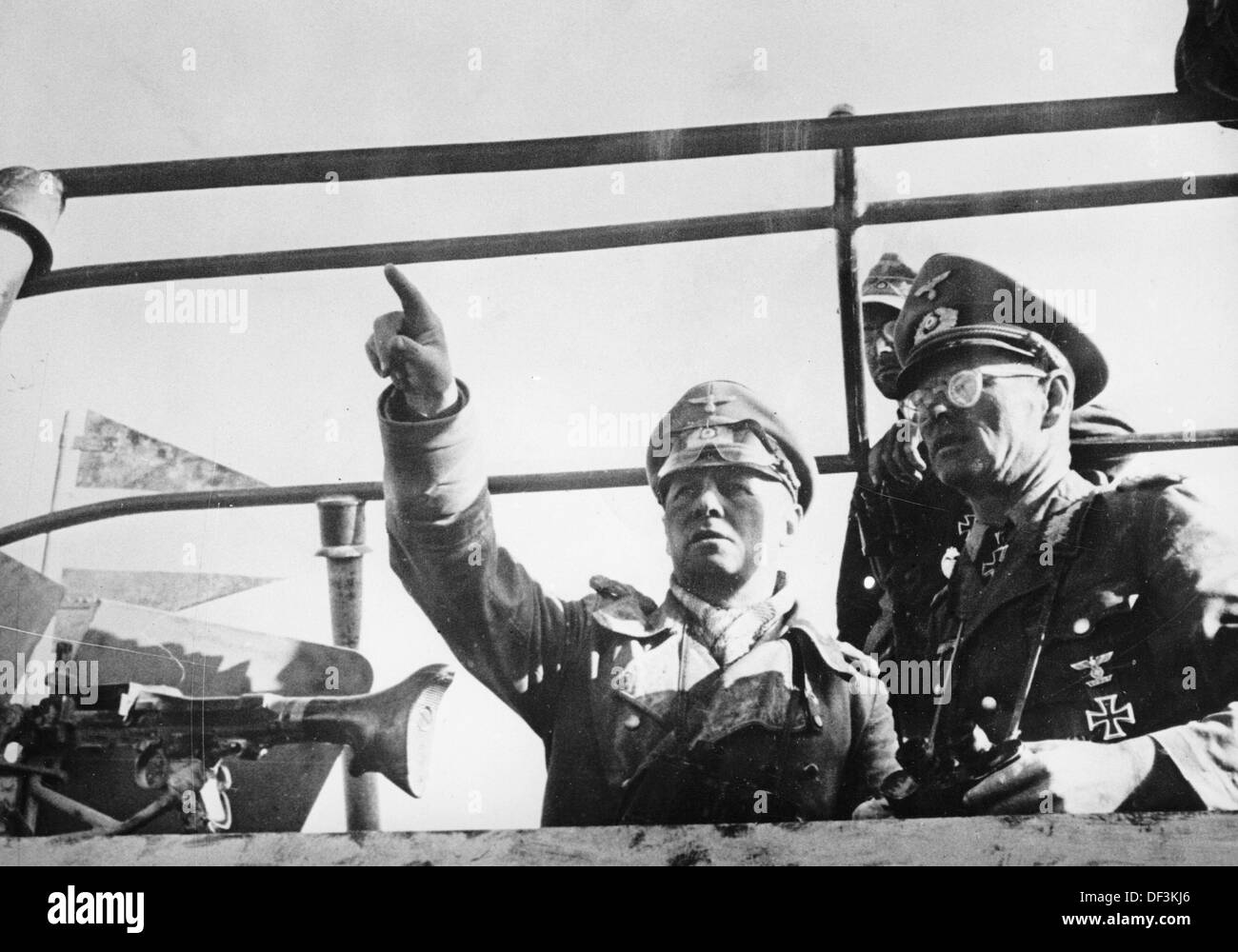 Field Marshal Erwin Rommel (l) talks to General Georg von Bismarck during the occupation of Tobruk in June 1942. The Nazi Propganda! on the back of the image is dated 26 June 1942: 'North Africa. Field Marshal Rommel plans new operations with General von Bismarck.' Fotoarchiv für Zeitgeschichte Stock Photo