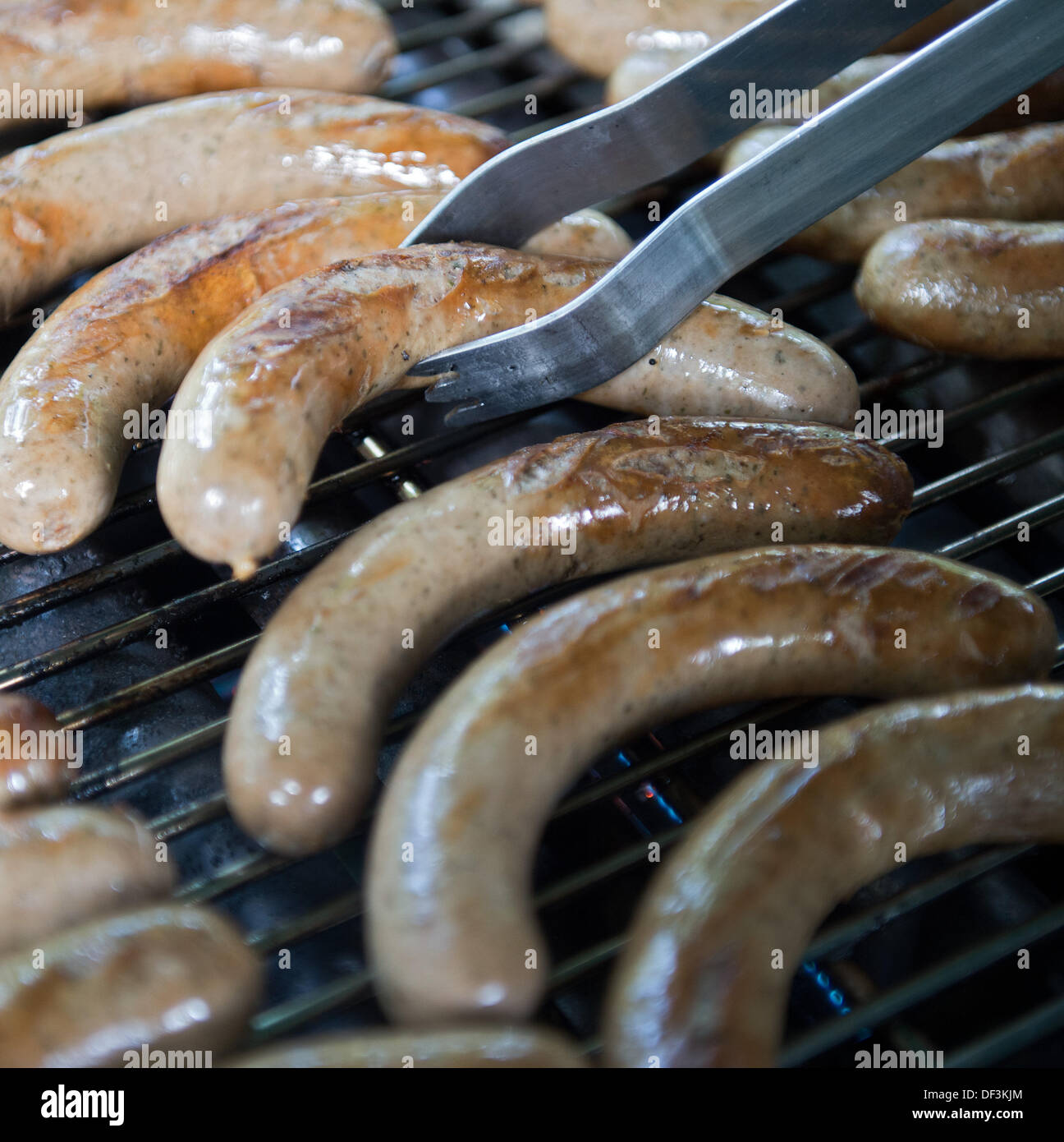 At the official beginning of the Saxonian venison season, saussages are fried and offered after a press conference in Dresden, Germany, 27 September 2013. More than 1000 hunters are involved in gamekeeping and hunting according to animal welfare. Photo: ARNO BURGI Stock Photo