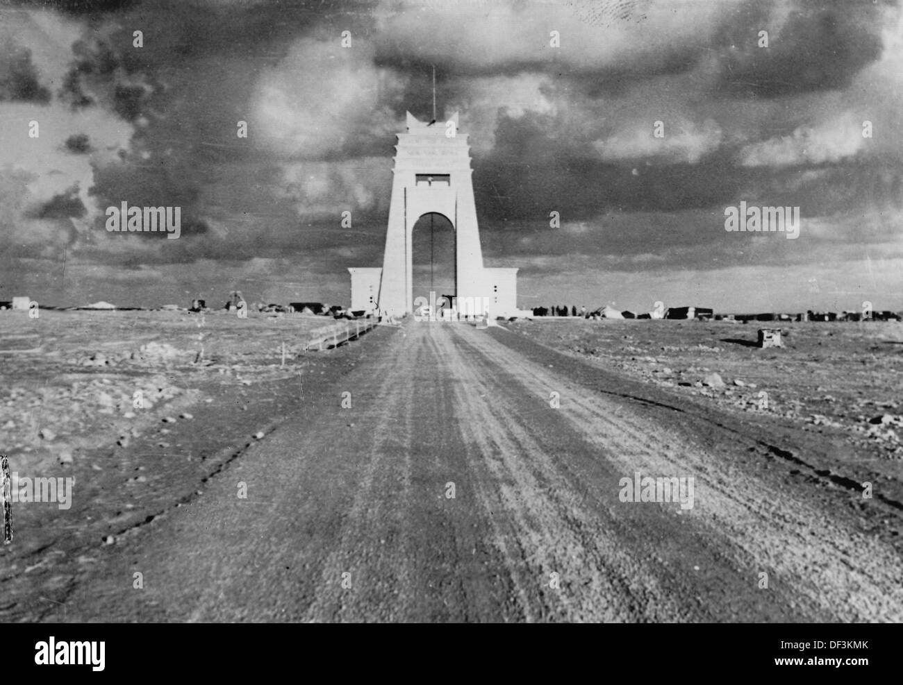The image from the Nazi Propaganda! gives a view of the coastal highway Via Balbia through the Marble Arch Arco dei Fileni (the 'Gate of the Desert') in Italian Libya, published 23 September 1940. The triumph arch was built by the Italian colonialists, opened in 1937, and was demolished by the revolutionary troops of Muammar Gaddafi in 1970. Fotoarchiv für Zeitgeschichte Stock Photo