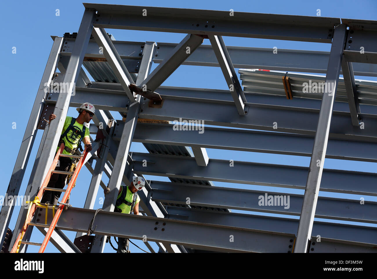 Iron workers construction site Stock Photo