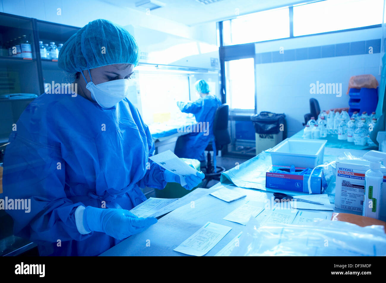 Pharmacy, drug preparation in hood, horizontal laminar flow