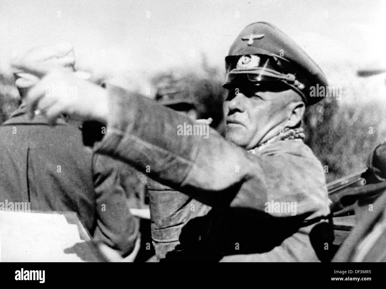 Field Marshal Erwin Rommel is pictured outside during the occupation of Tobruk, Libya, in May 1942. The Nazi Propaganda! on the back of the iamge is dated 30 May 1942: 'From the front in North Africa. General Rommel visits a base on the frontline.' Fotoarchiv für Zeitgeschichte Stock Photo