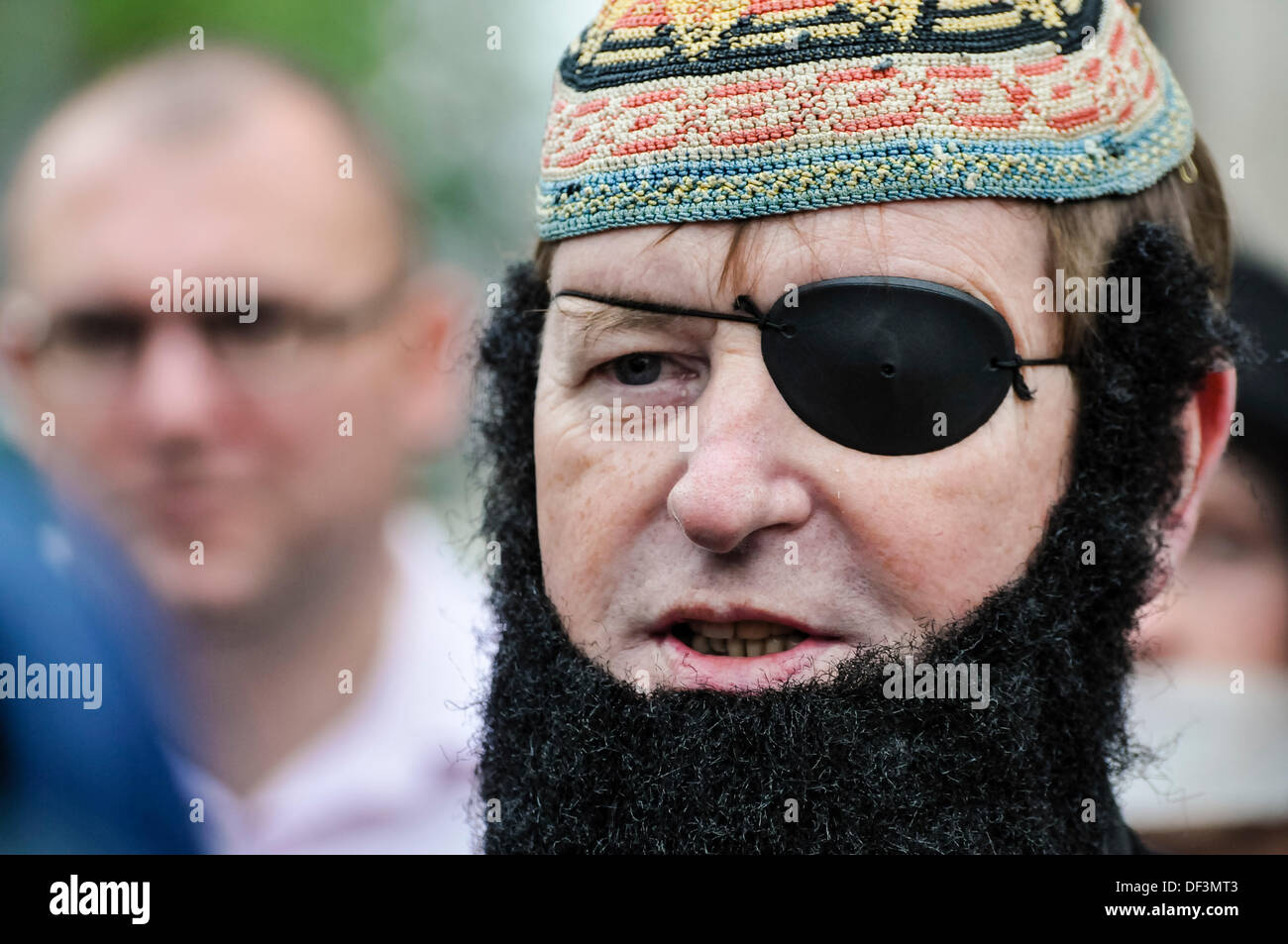 Belfast, Northern Ireland, 27th September 2013 - Protestant Coalition founder member Willie Frazer appears in court dressed as Abu Hamza. He is protesting that he is being charged under legislation aimed at curbing "infamous Muslim hate preachers". Stock Photo