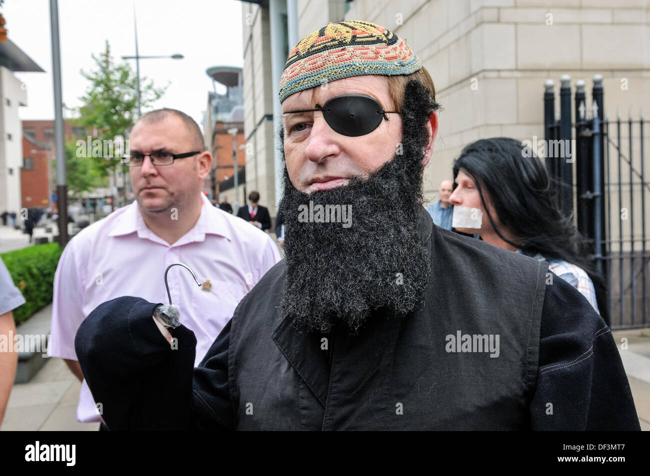 Belfast, Northern Ireland, 27th September 2013 - Protestant Coalition founder member Willie Frazer appears in court dressed as Abu Hamza. He is protesting that he is being charged under legislation aimed at curbing "infamous Muslim hate preachers". Credit:  Stephen Barnes/Alamy Live News Stock Photo