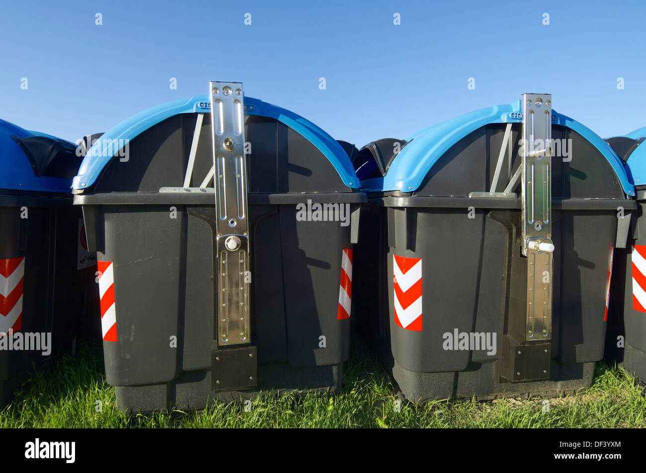recycling bins for paper with blue sky Stock Photo Alamy