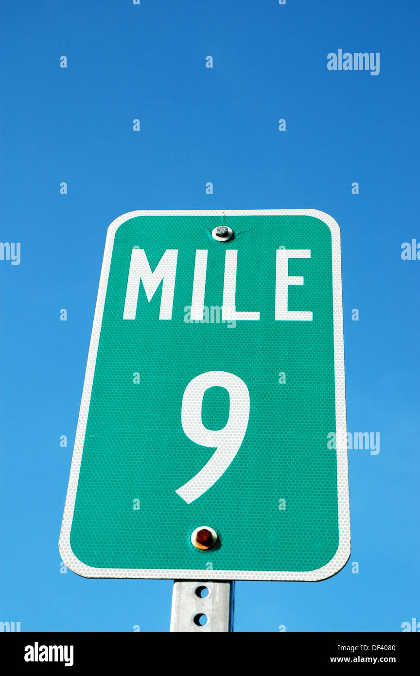 9 nine mile distance marker sign on freeway highway Stock Photo Alamy