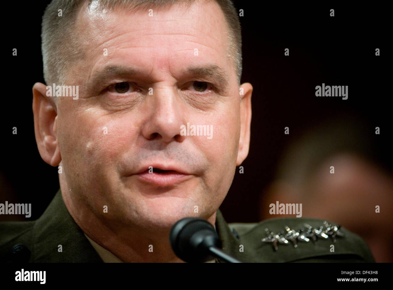 Commander, United States Strategic Command, U.S. Marine General James E. Cartwright, testifies during his confirmation hearing in front of the U.S. Senate Armed Services Committee for appointment to Vice-Chairman of the Joint Chiefs of Staff at Hart Senate Office Building, Washington, D.C., July 31, 2007. Cartwright was joined by Chief of Naval Operations, Admiral Mike Mullen (not pictured) in testimony to his appointment to Chairman, Joint Chiefs of Staff. Cartwright is a target of a Justice Department investigation into a leak of information about a covert U.S.-Israeli cyberattack on Iranâ?? Stock Photo