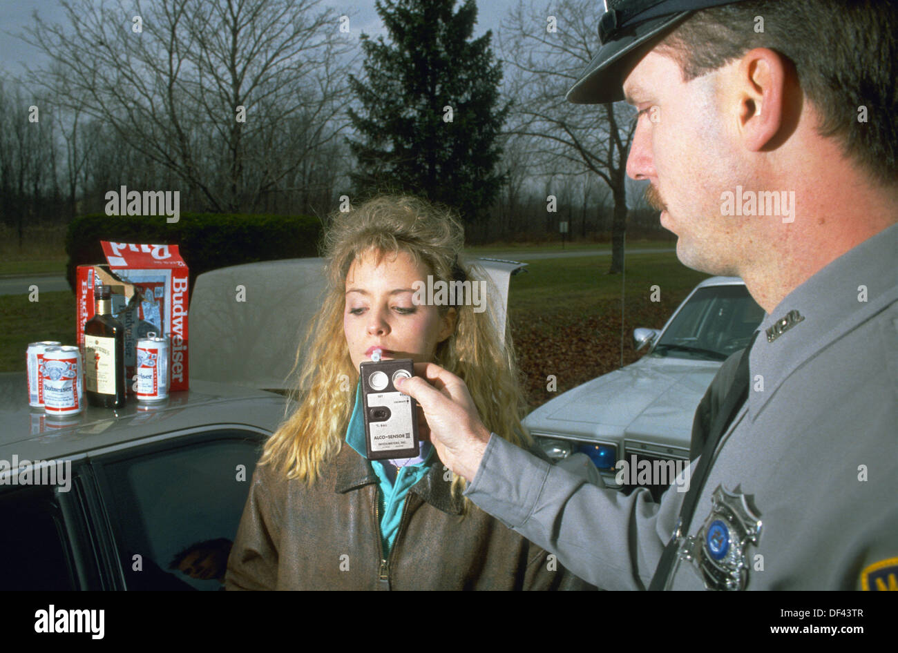 Police gives female teen blood alcohol test Stock Photo Alamy