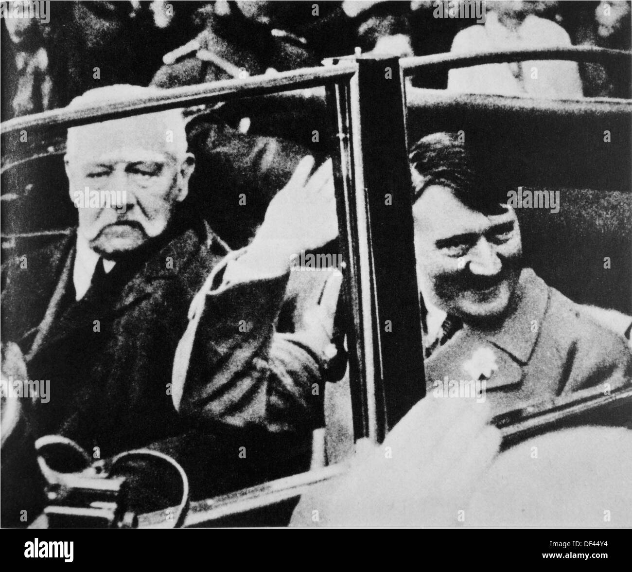 President Paul von Hindenburg and Chancellor Adolf Hitler in Car, Germany, 1933 Stock Photo