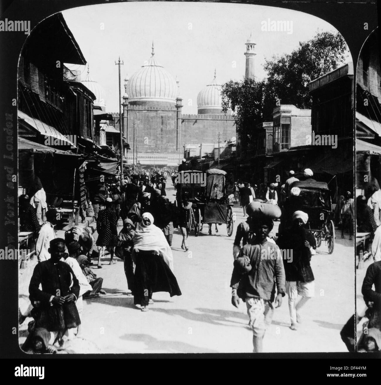 Busy Street Scene with Mosque in Background, Delphi, India, 1907 Stock Photo