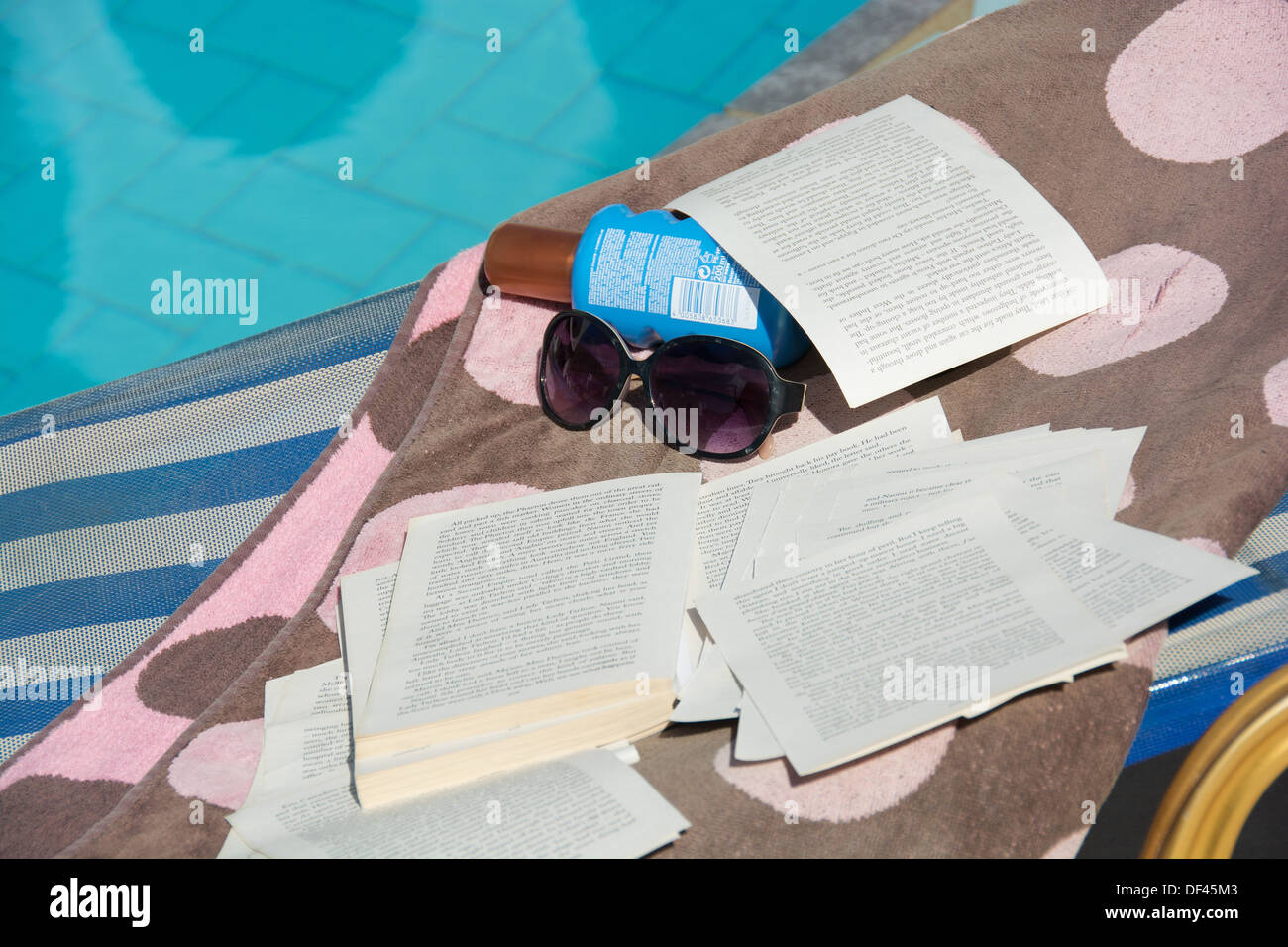 A paperback book falling apart concept shot to illustrate one