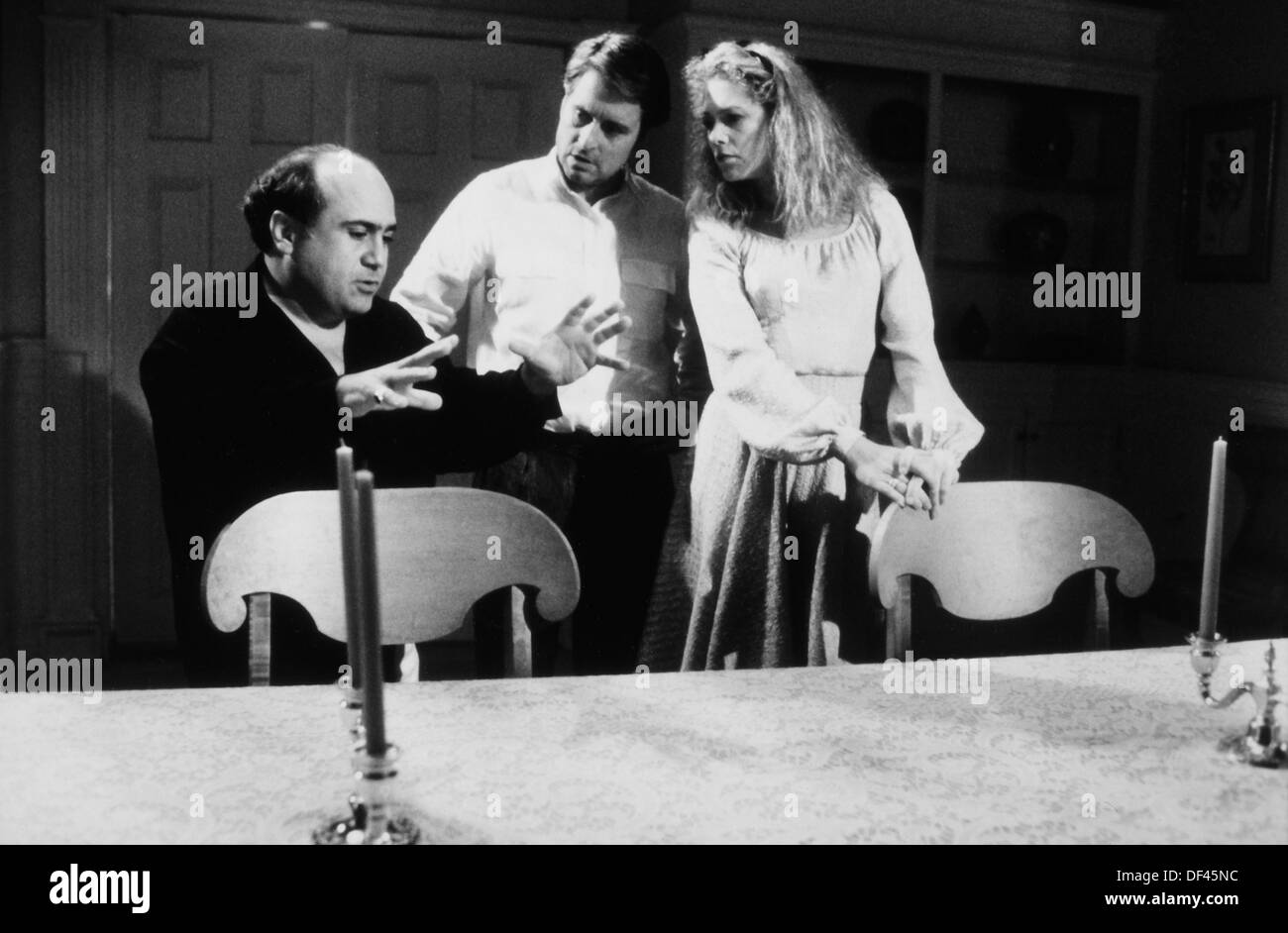 Danny Devito Directing Michael Douglas and Kathleen Turner on-set of the Film, "The War of the Roses", Photo by Francois Duhamel, Gracie Films with Distribution via 20th Century Fox, 1989 Stock Photo