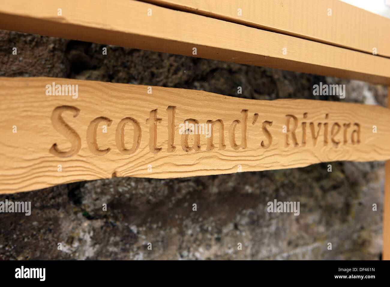 Scotland's Riviera wooden sign in the Fife coastal town of Aberdour Stock Photo