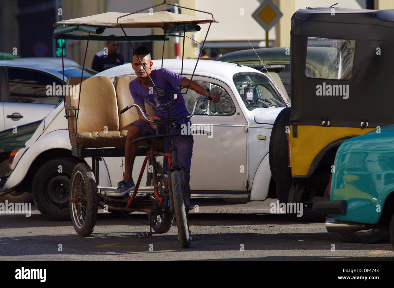 Bici-taxi driver in Old Havana, Cuba Stock Photo