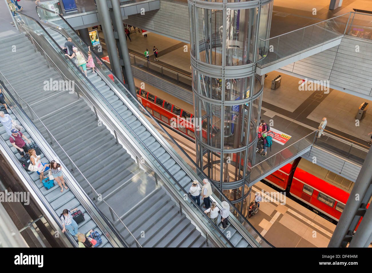 Tourists and workers are waiting for the train at the central station of Berlin, Gemany Stock Photo