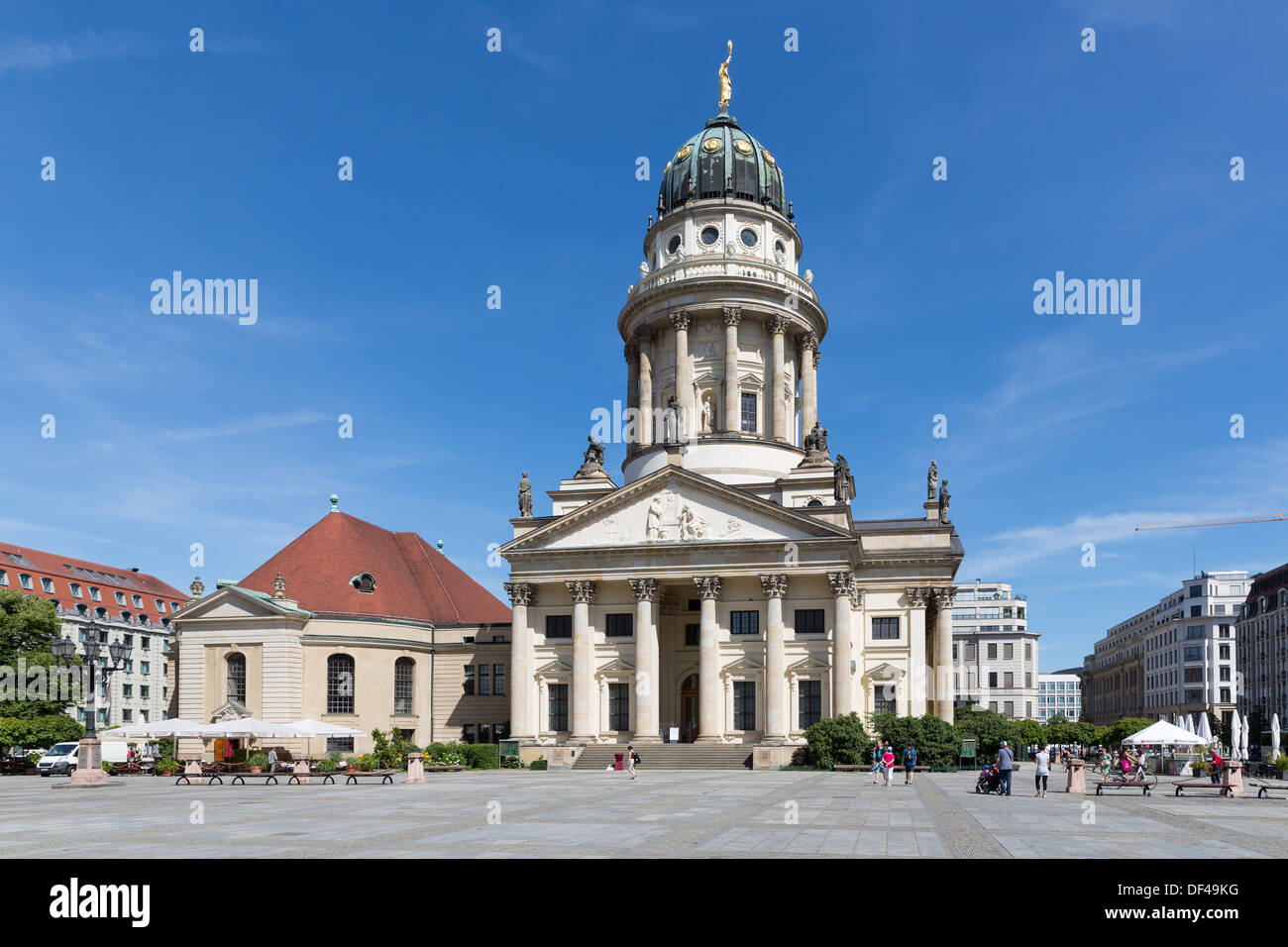 Franzosische Dom and Church with admiring tourists at the Gendarmenmarkt in the center of the city Berlin, Germany Stock Photo