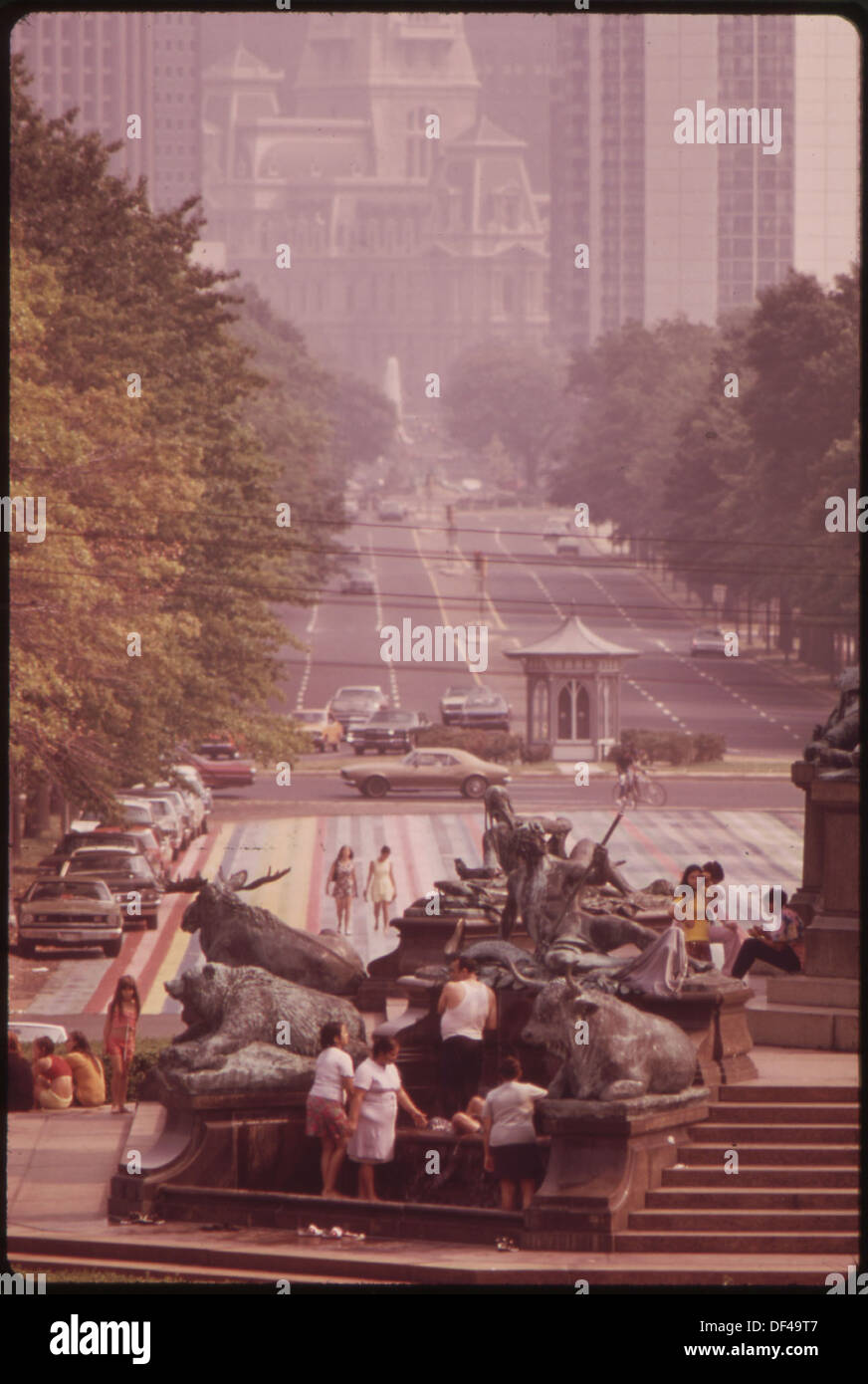 A view from the steps of the Philadelphia Museum of Art looking down Benjamin Franklin Parkway towards City Hall. This iconic perspective captures the heart of Philadelphia, with its historic architecture and urban landscape stretching ahead. Stock Photo