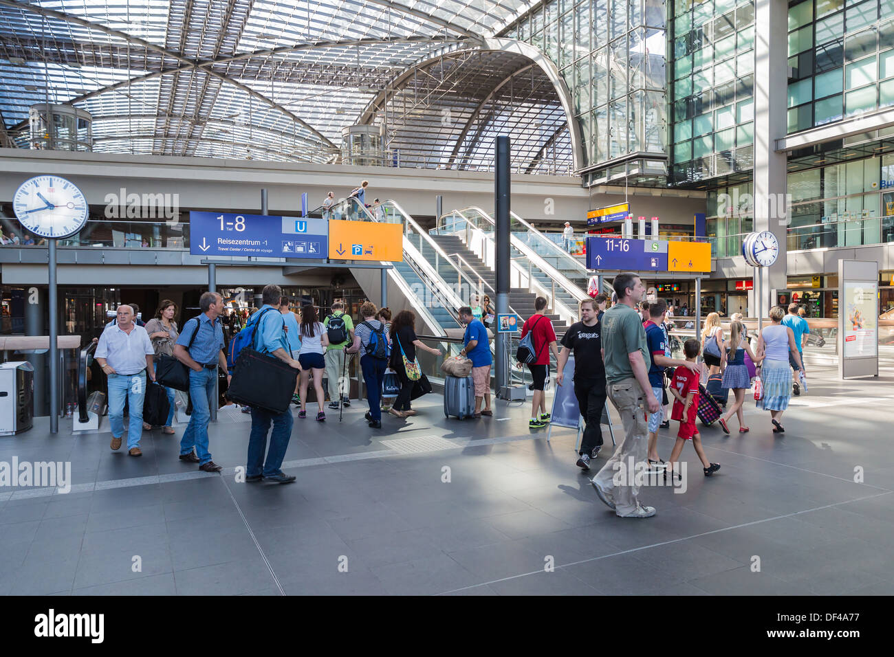 Tourists and workers are shopping and traveling at the central station of Berlin, Germany Stock Photo