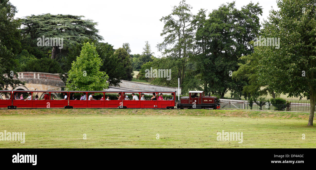 Ride on miniature railway train coming back to station at Audley End Saffron Walden Essex England Stock Photo