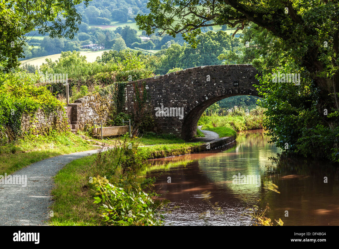 Stone bridge over the Monmouthshire and Brecon Canal at Llangynidr in the Brecon Beacons National Park. Stock Photo