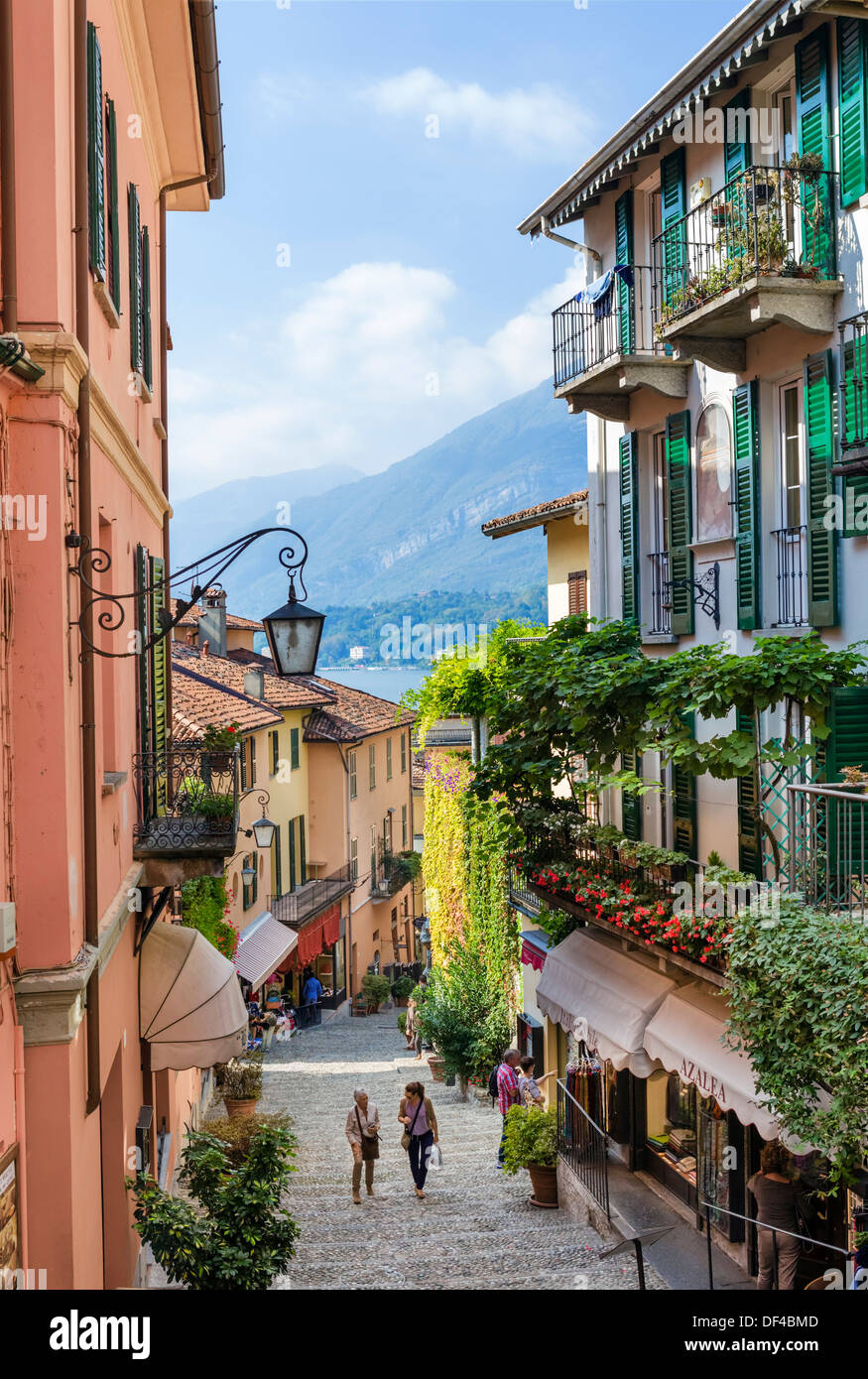 Shops on Salita Serbelloni in the historic old town with the lake in the distance, Bellagio, Lake Como, Lombardy, Italy Stock Photo