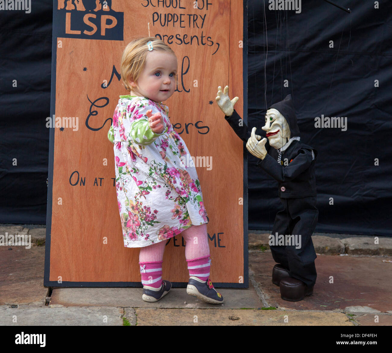 Skipton UK. 27th September, 2013. International Puppet Festival. Daisy Le Drew, 1 year old baby from Derby at Skipton's biennial international puppet festival, sideshow featuring puppet theatre control companies from all over Europe. Stock Photo