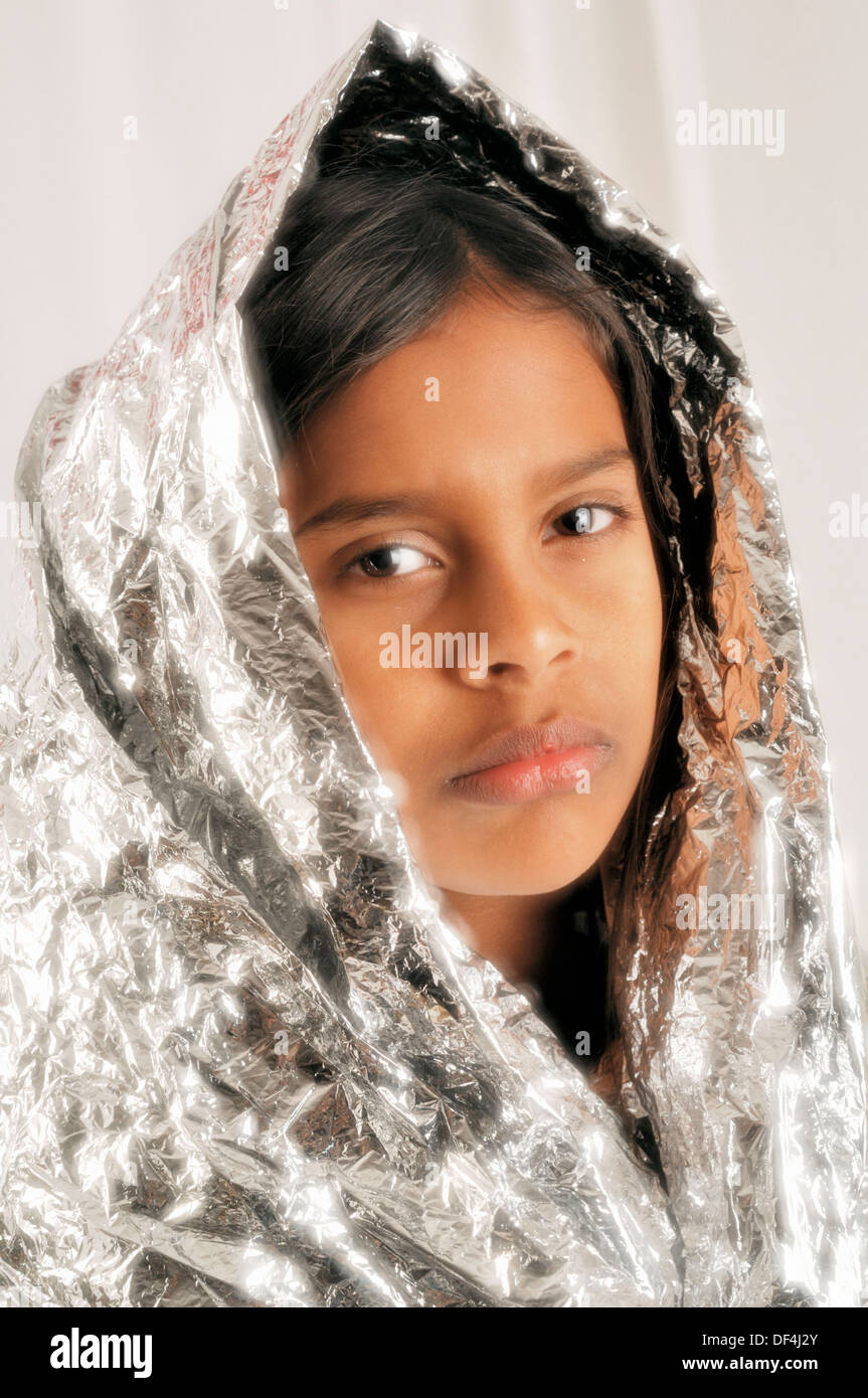 11-year-old-indian-girl-wrapped-in-silver-foil-looks-like-a-maddonna